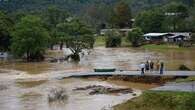 Pregnant mum of two is 'completely trapped' in floods