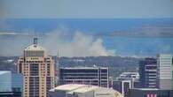 Passenger heard 'bang' as reported engine explosion sparks grassfire at Sydney Airport