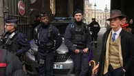 Mystery 'fedora man' at Louvre robbery scene unmasked