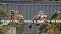 Man arrested after allegedly pointing gun at police in Melbourne