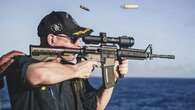 US Navy fires warship commander over photo of rifle with backward scope