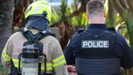 Woman charged with arson, assaulting officer after Adelaide house fire