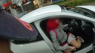 Body-worn camera footage shows the moment police arrest suspected car thief