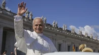 Pope Leo XIV takes his first popemobile ride through St Peter's Square