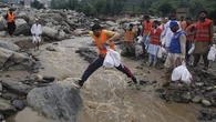 Pakistan defends flood response after more than 270 people killed