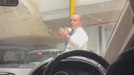 Former Prime Minister becomes traffic controller in Sydney car park