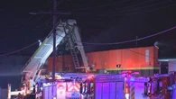 Fire rips through Melbourne business after car torched