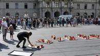 Austria falls silent for a minute as questions remain about school shooting motive