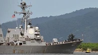 US warship arrives in Caribbean capital, upping heat on Venezuela