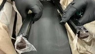How fluid oozing from suitcase alerted police to hidden find