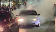 Chaos as car hoons take over iconic Melbourne strip
