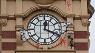 Mystery graffiti on iconic heritage-listed clock tower