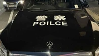 Man, 20, caught 'impersonating foreign police' before guns found at his home