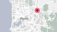 Homicide squad investigating death of man found on street corner in Perth