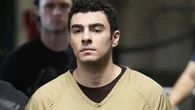New York judge tosses terrorism charges against alleged CEO killer