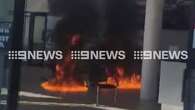 Customers terrified after man allegedly sets Sydney car dealership alight