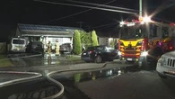 Four evacuated after home, cars found on fire in Sydney