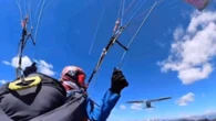 Video shows paraglider's heart-stopping fall after plane collision