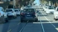 Man throws hammer at woman's car in road rage incident in Melbourne