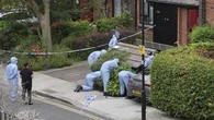 Man charged with murder after body parts found in suitcases on UK bridge