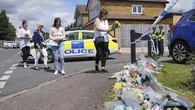 British police arrest man on suspicion of crossbow murders