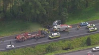 Man killed, woman injured after ute veers off highway into creek