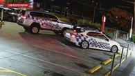 Woman arrested after allegedly ramming police cars in Hungry Jack's car park