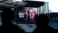 Footy legend's last words read out at moving memorial