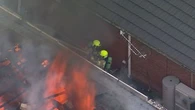 Firefighters battle out-of-control house fire in western Sydney