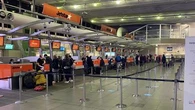 Sydney Airport a ghost town as more than 90 flights cancelled