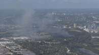 Fire crews tackle bushfire near Sydney Olympic Park