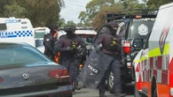 Man arrested after hour-long siege, stabbing in western Sydney