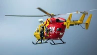 Rock fisherman dies after being swept into water north of Sydney