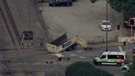 Three hospitalised, commuter chaos after truck and train collide