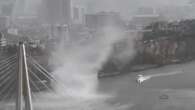 Incredible moment gustnado rips through Brisbane River during wild storm