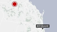 Man airlifted to hospital after getting trapped under grain silo in Queensland