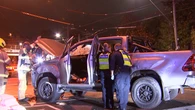 Man arrested, woman flees after car smashes into tram stop