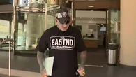 Cops label bikie 'middle-aged man playing dress-ups' over Nazi tat charge