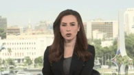 TV anchor forced to take cover after building hit live on air