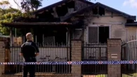 Mother charged with murder after house fire leaves three children dead