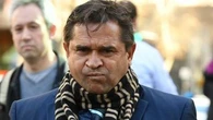 AFL legend Nicky Winmar accused of choking, assaults