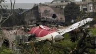 Investigators search the Air India crash site for evidence and more victims
