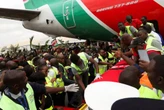 Mourners briefly storm Kenyan airport to receive Odinga’s body
