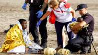 Exhausted migrants arrive on beach in Spain’s Canaries