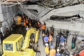 Indonesia rescuers hunt for 38 feared trapped from school collapse