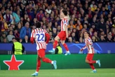 Atletico Madrid storm Camp Nou with 2-0 win over 10-man Barcelona