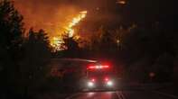 Athens wildfire fanned by gale force winds