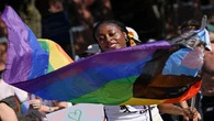 With rage and humor, WorldPride rally takes aim at Trump