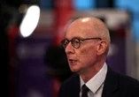 British minister heckled at London antisemitism rally