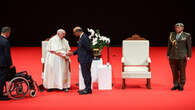 Pope Francis, in Singapore, urges fair wages for migrant workers